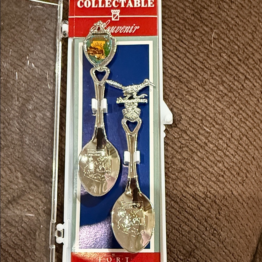 Elegant Silver Collectible Spoons by [Brand]